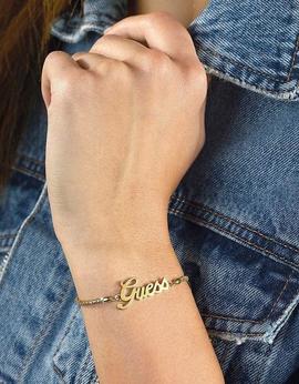 Pulsera GUESS dorada centro letras  GUESS