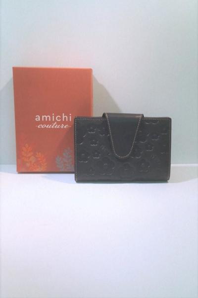 cartera med marina flores solap/broch