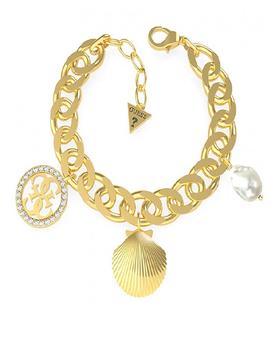 Pulsera GUESS dorada charms concha, perla y símbolo